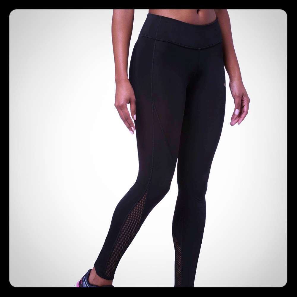 PUMA black Explosive Tight w/fishnet detail on leg